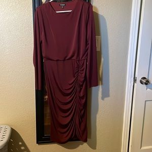 Express medium long sleeve dress. New with tags in a Burgundy color